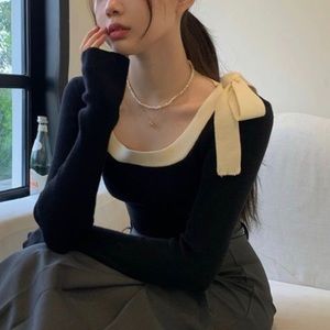 Black long sleeve with white bow detailing